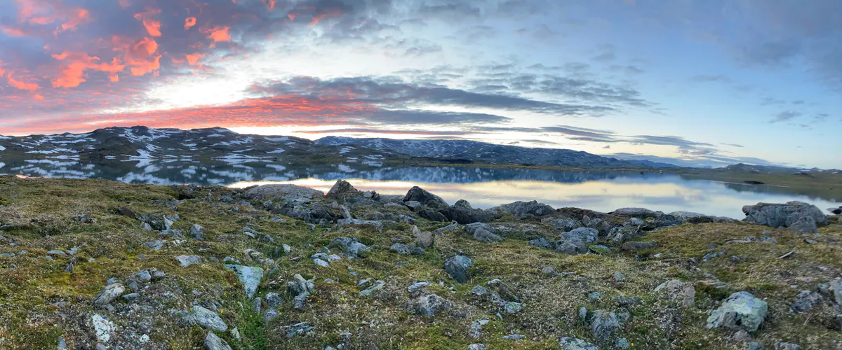 Stony fell landscape and lake at sunset