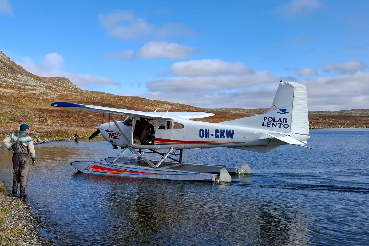 Floatplane moored on a clear mountain lake
