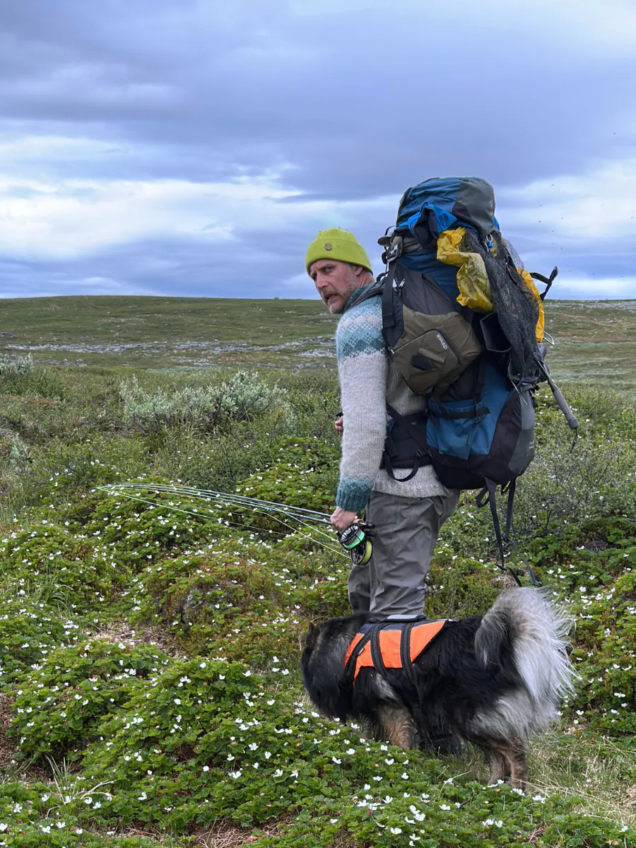 Teemu with Bruce the Finnish Lapphund on a fell